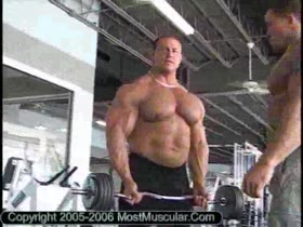 Art doing dumbell curls