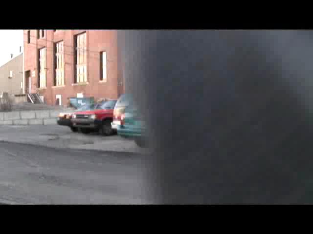 Bodybuilder lifts Car