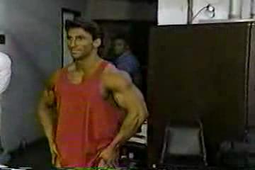 Oiling bodybuilder