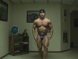 Competitor flexes at home
