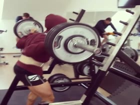 Teen athlete Tomas squats