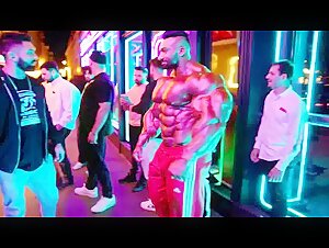 Persian Bodybuilder in front of a club